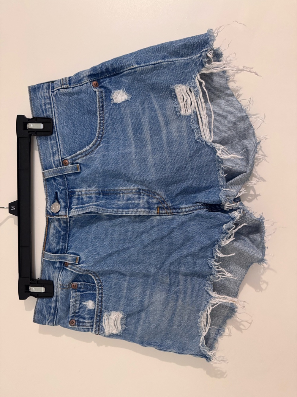 Levi's Light Wash Frayed Hem Jean Shorts